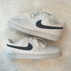 Nike White Sneakers with Black Swoosh